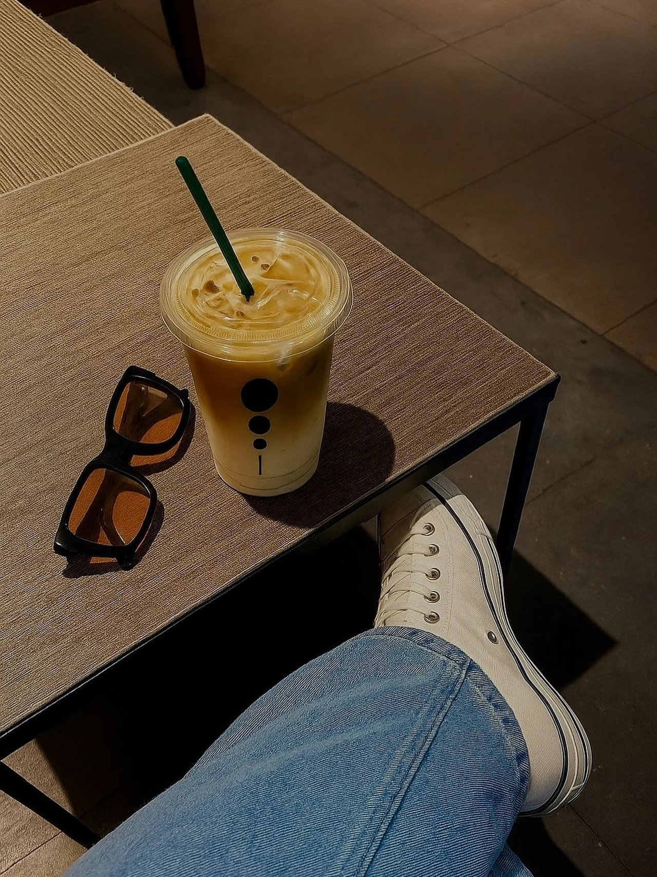 An iced KAFI drink on an outdoor table